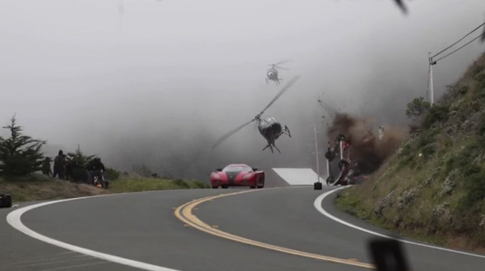 Two camera helicopters filming Koenigsegg car flip stunt in Need for Speed